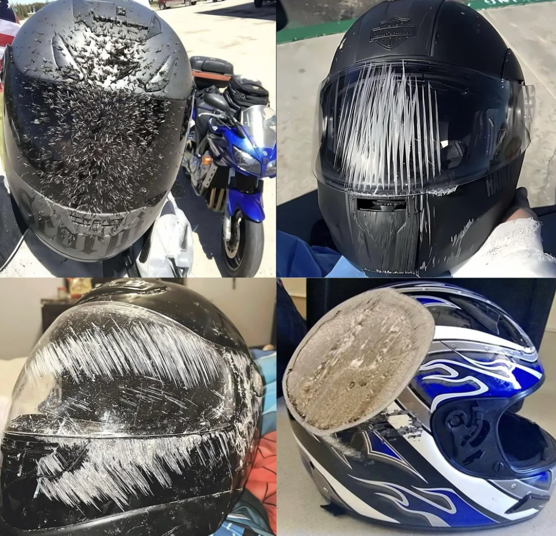 Four motorcycle helmets with assorted scratch and interaction marks, showcasing harm from imaginable accidents