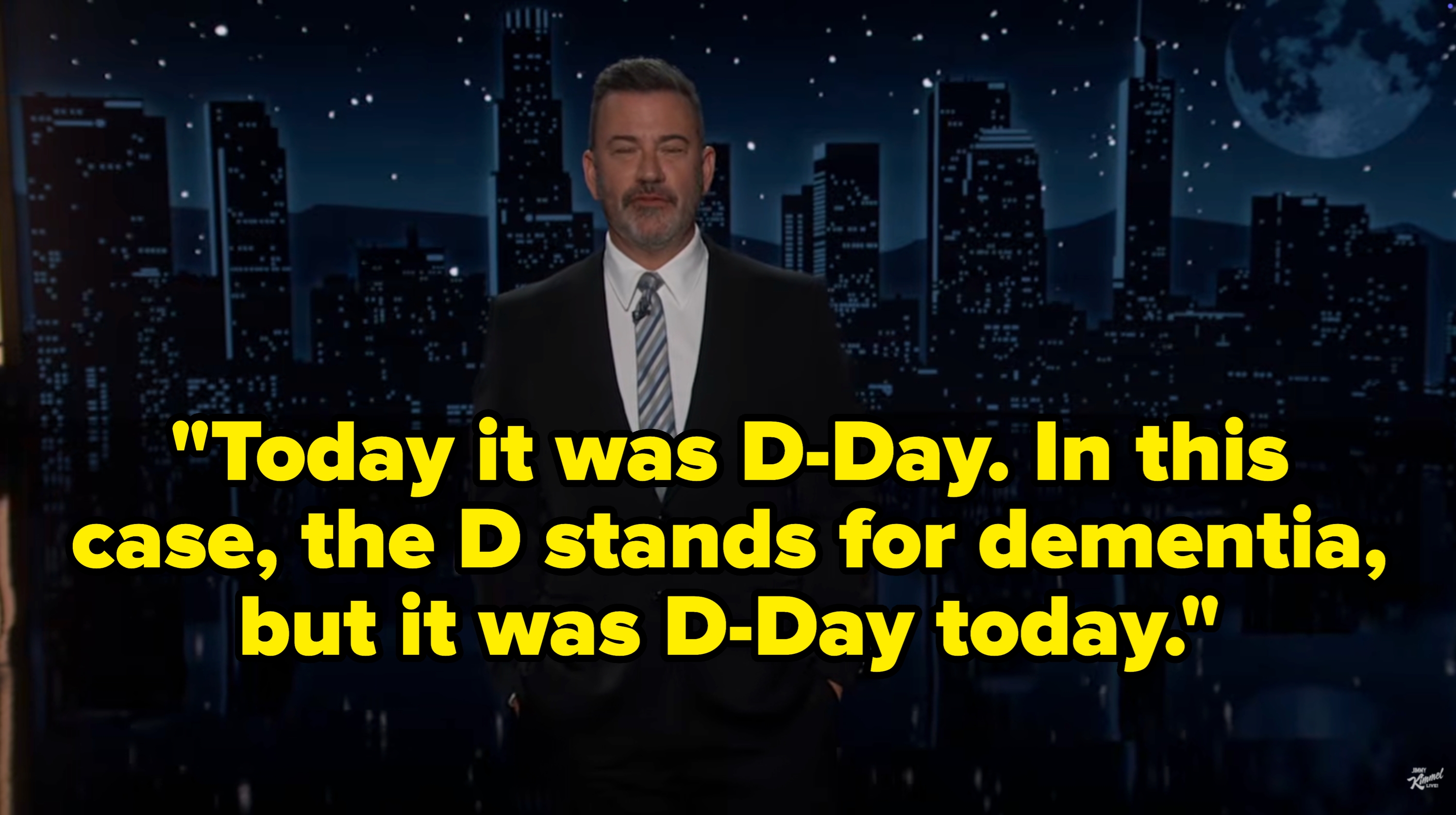 Man successful  a suit   stands against a nighttime metropolis  skyline backdrop, appearing connected  a speech   amusement   set