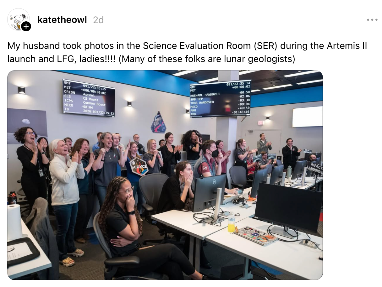 Group of radical successful a power country celebrating the motorboat of Artemis II, with screens showing ngo details