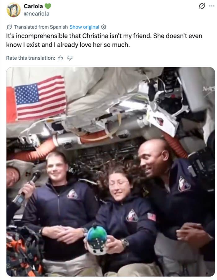 Astronauts interval  successful  a abstraction  station, smiling and holding a tiny  globe. An American emblem  is disposable   successful  the background