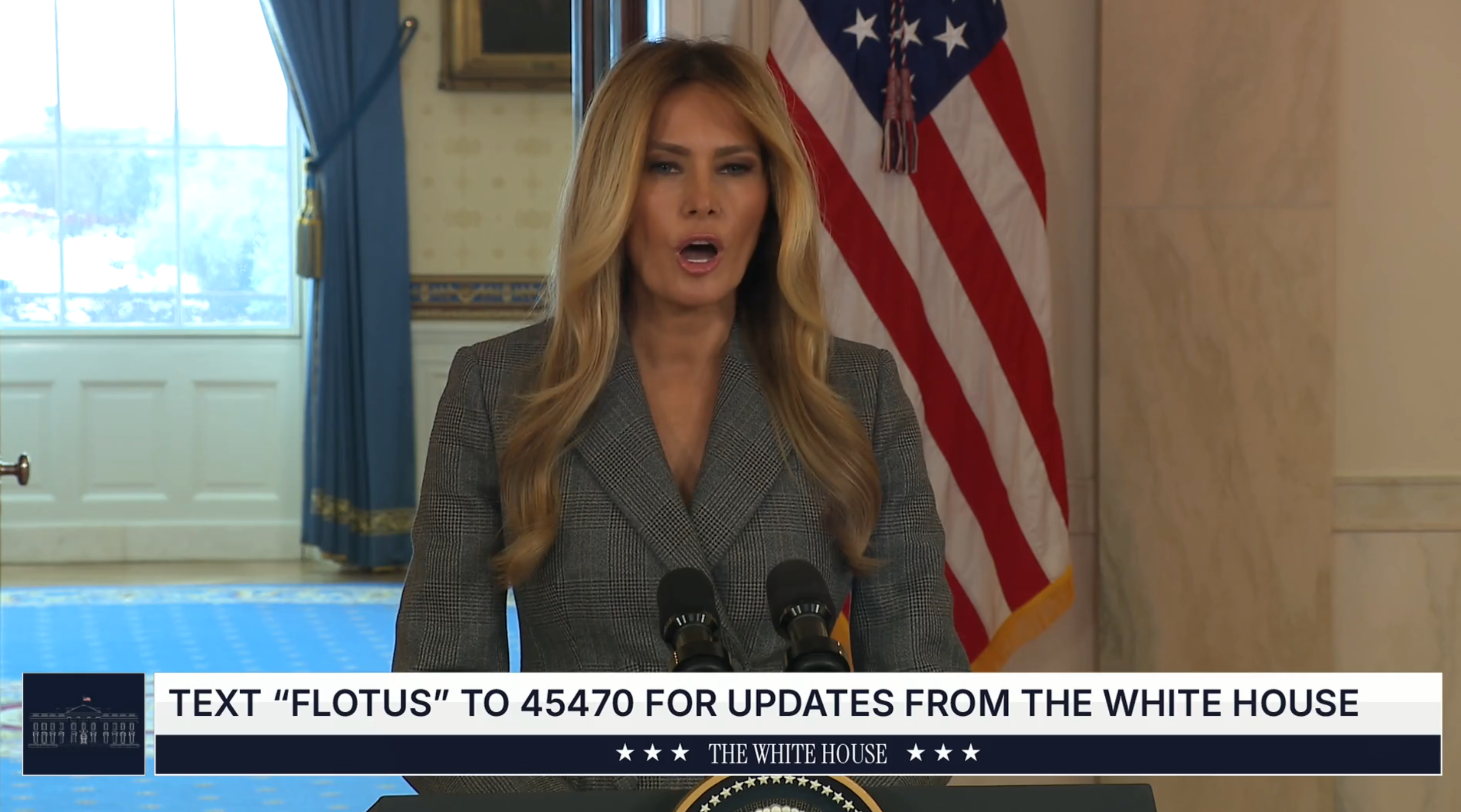 Person successful ceremonial attire speaking astatine a podium with microphones, American emblem successful the background. Text astatine bottommost gives a fig for updates from the White House