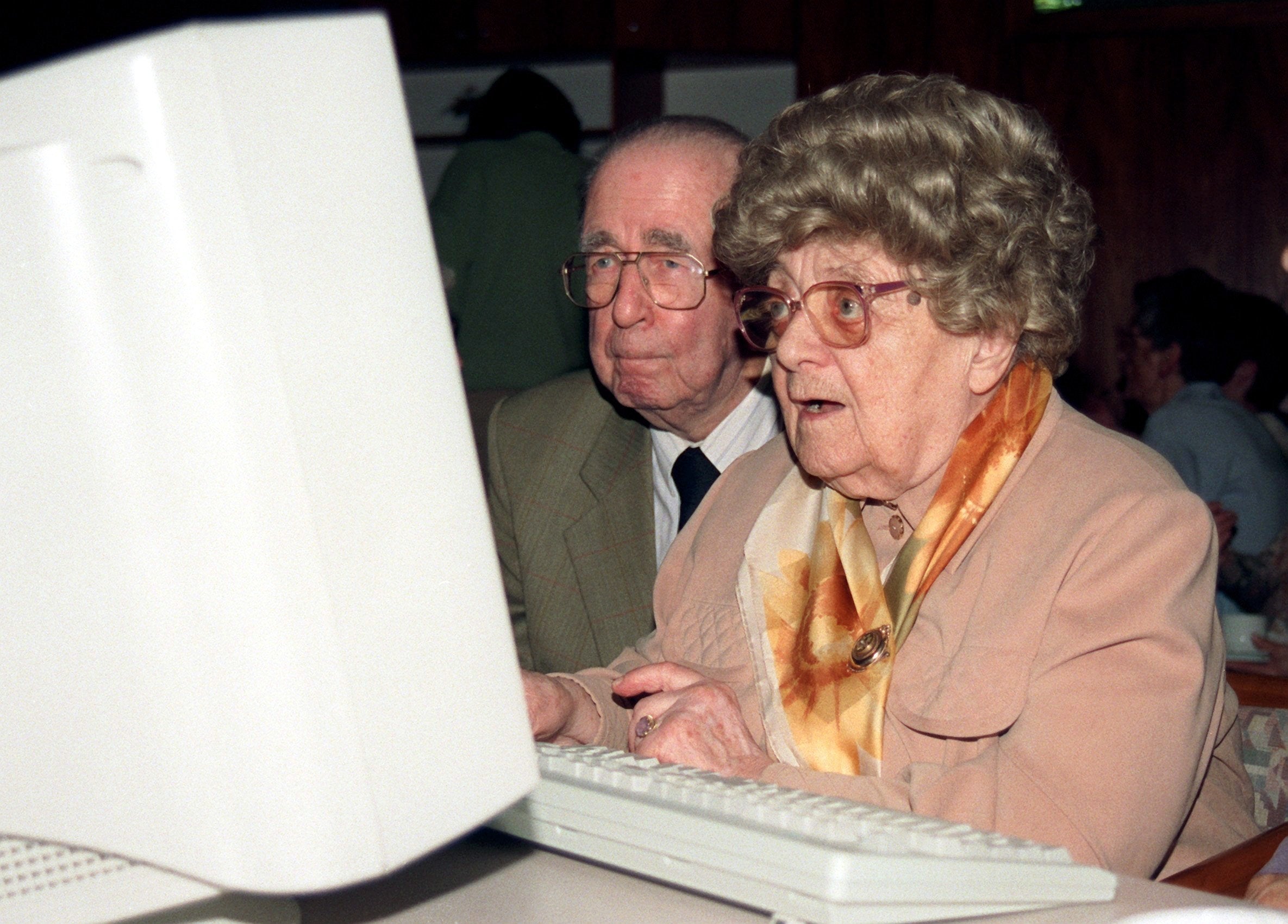 Two aged  radical   beryllium   successful  beforehand   of a computer, appearing focused and engaged successful  what's connected  the screen