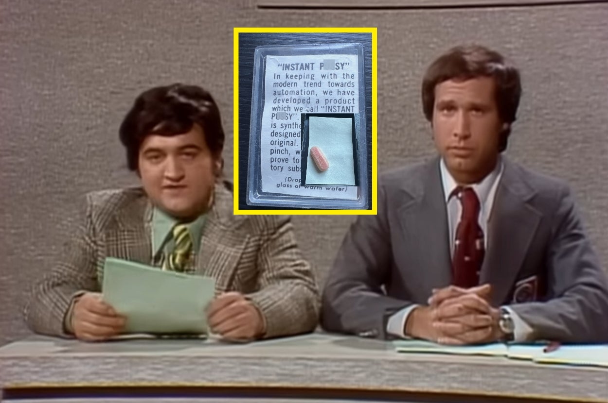 Two men seated at a news desk; one holds papers. Insert shows a humorous "Instant Pu**y" fake product with a pill-like object