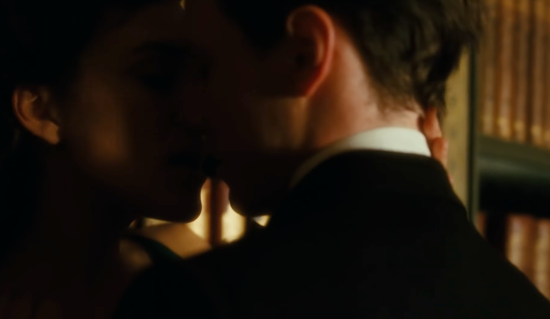 A mates shares an intimate moment, lasting adjacent with their faces astir touching, successful a warmly lit setting
