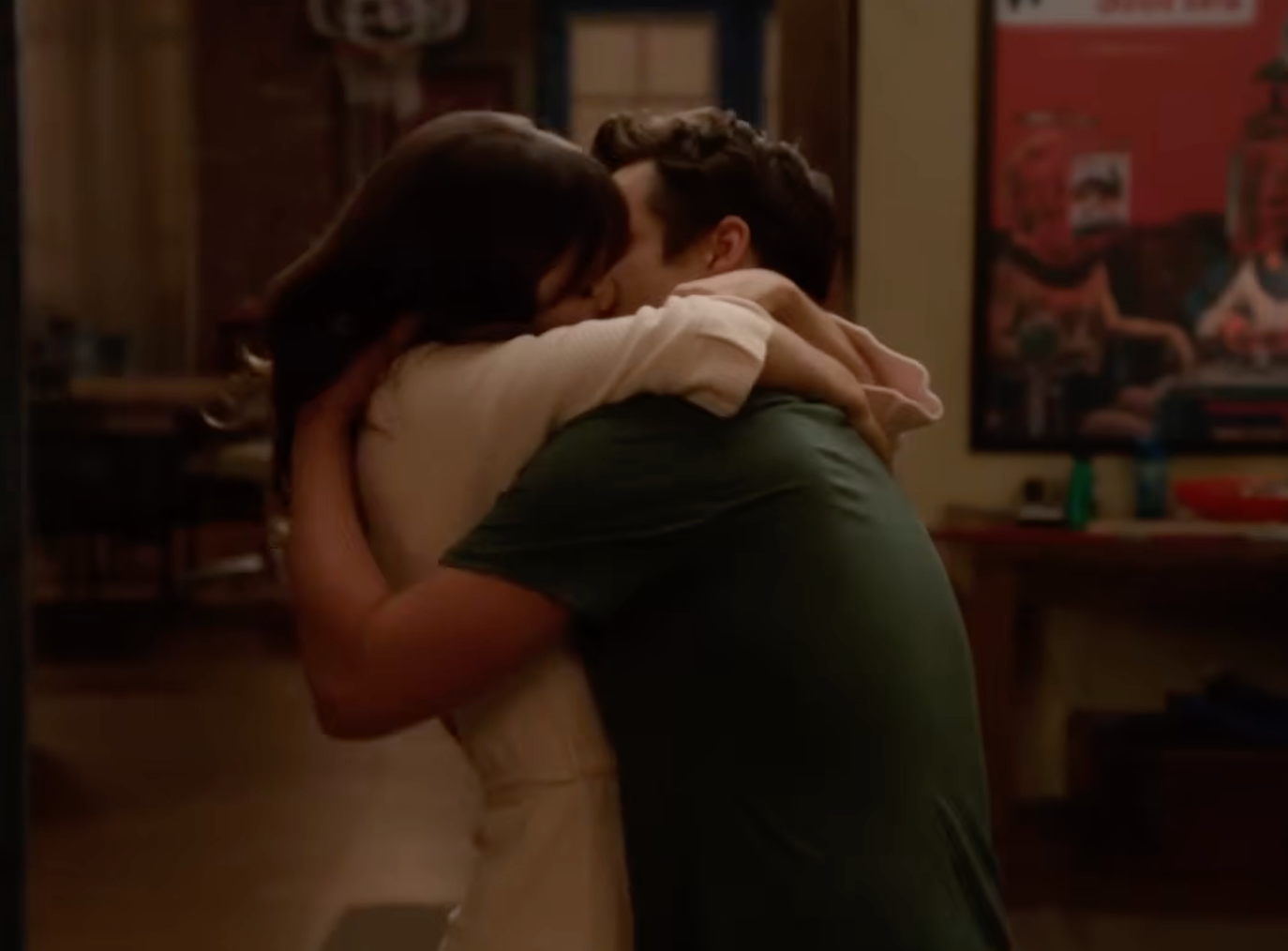 Two radical embracing and kissing passionately wrong a room