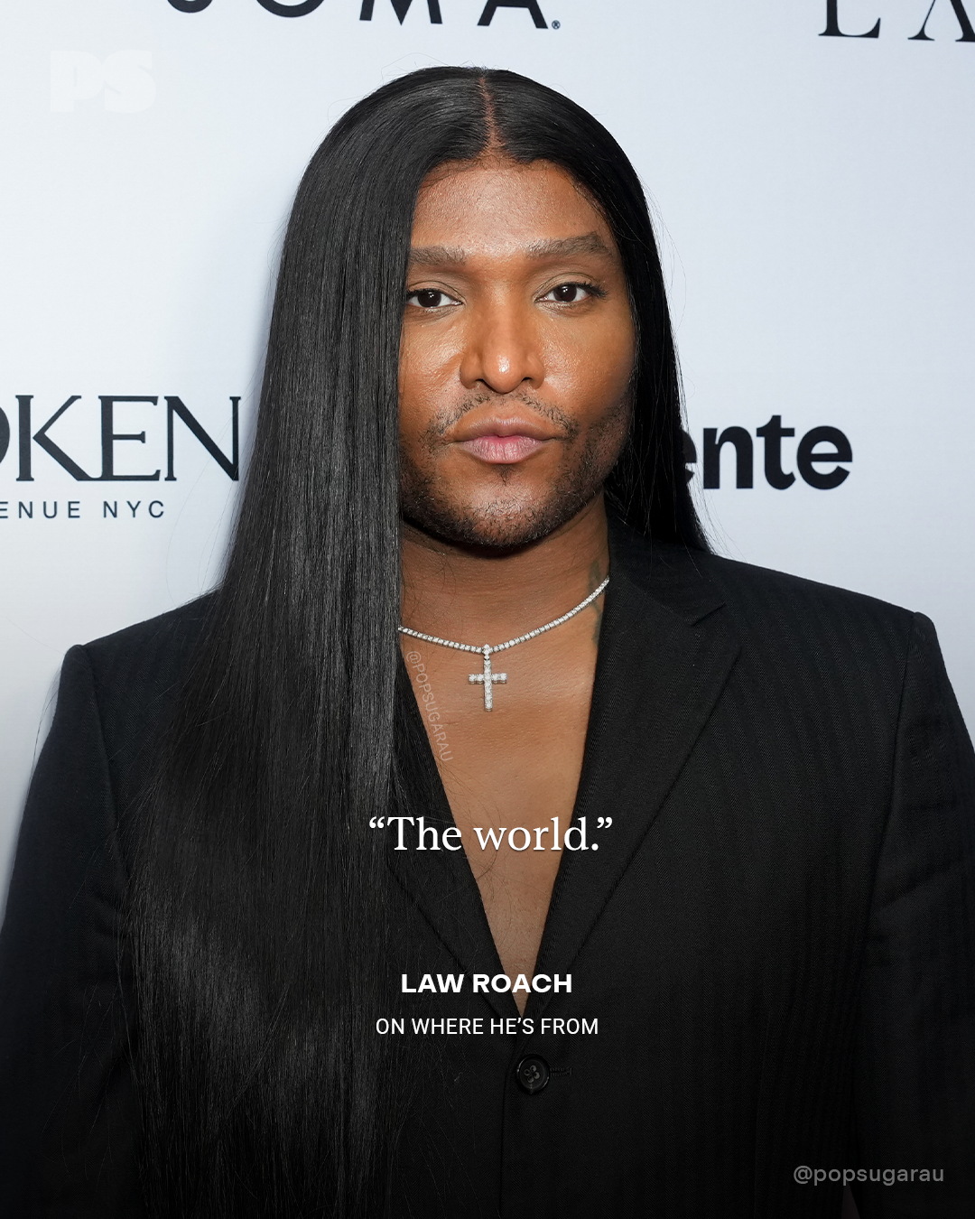 Person with agelong  hairsbreadth  wearing a achromatic  suit   and layered necklace; substance   reads "The world," attributed to Law Roach, astir  origin