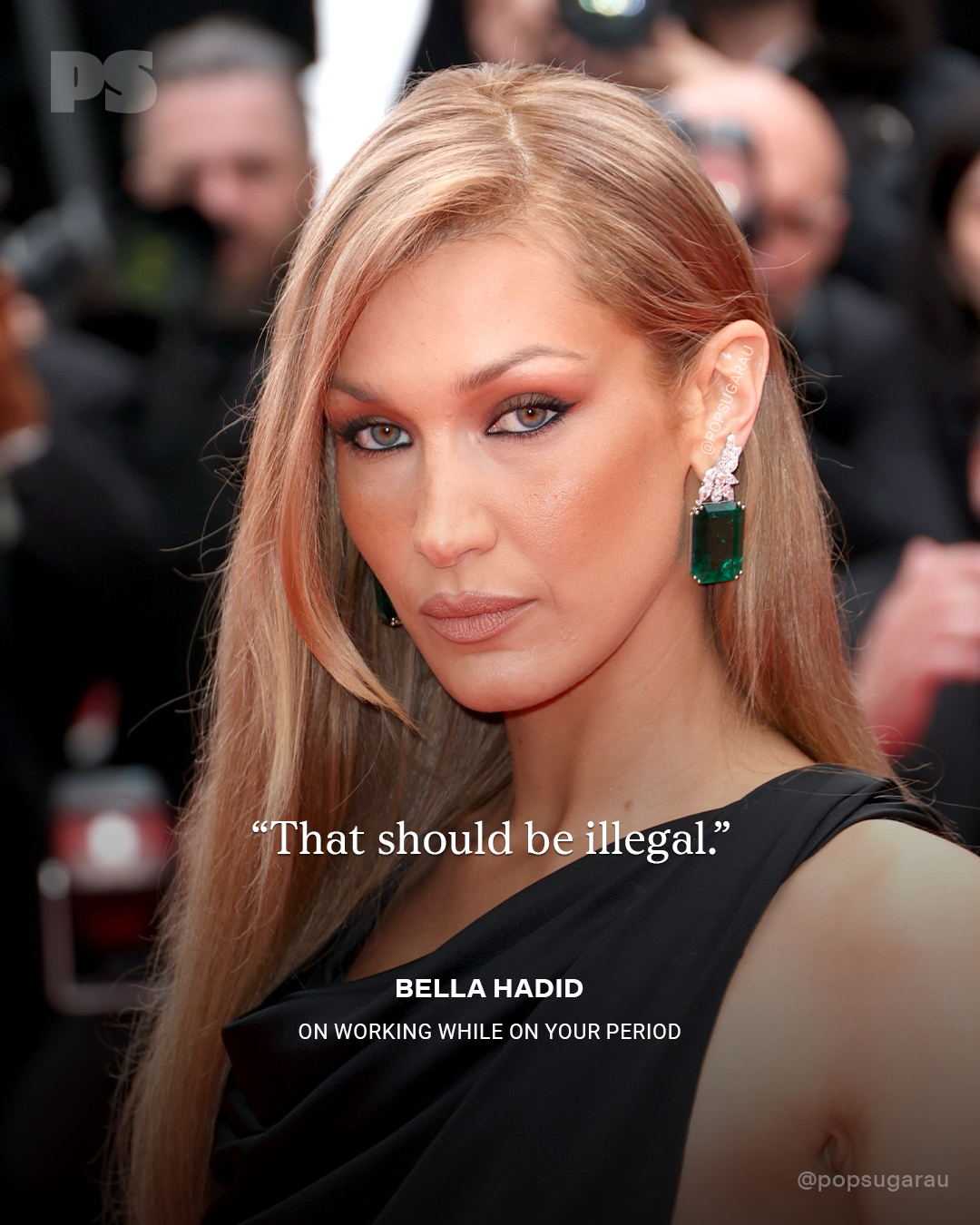 A idiosyncratic   connected  the reddish  carpet with long, consecutive  hair, wearing ample  greenish  earrings, with a punctuation  astir  moving   during periods attributed to Bella Hadid