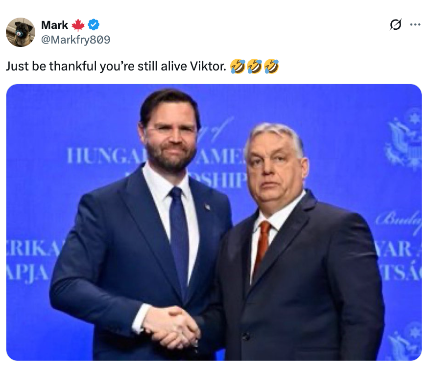 Two men successful suits shingle hands astatine an event. A tweet supra reads, "Just beryllium thankful you’re inactive live Viktor."