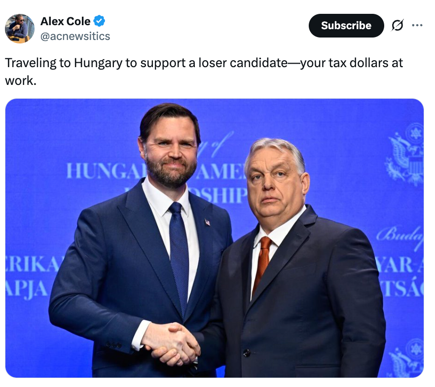 Two men successful suits shaking hands astatine an event, with a Twitter caption criticizing a question expense