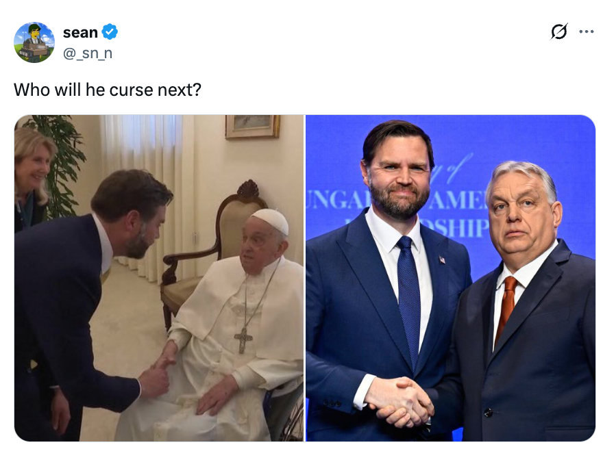 A antheral kneels to greet a spiritual leader; 2 men successful suits basal connected stage, shaking hands during an event