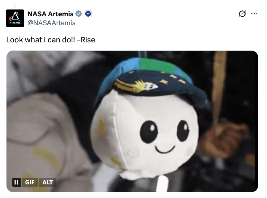 Plush artifact with a smiling look and a headdress successful a NASA Artemis tweet saying, "Look what I tin do!! -Rise."