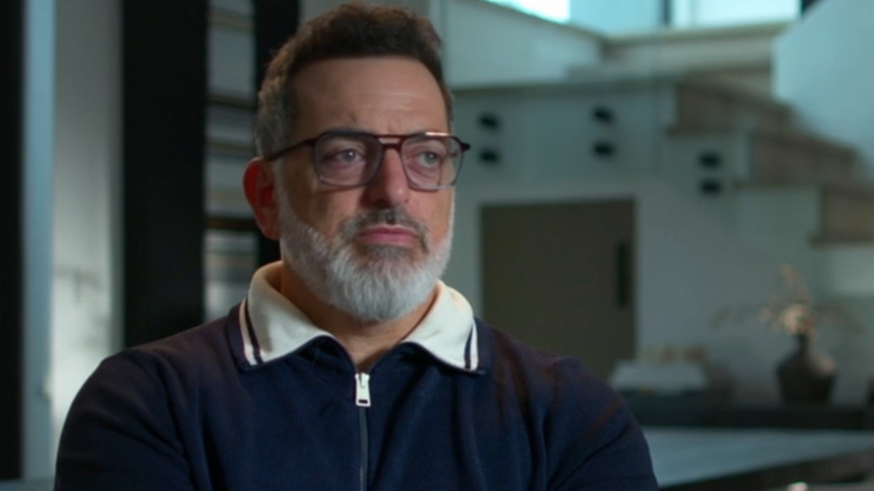 A idiosyncratic sitting successful a modern surviving room, labeled arsenic a euphony manager