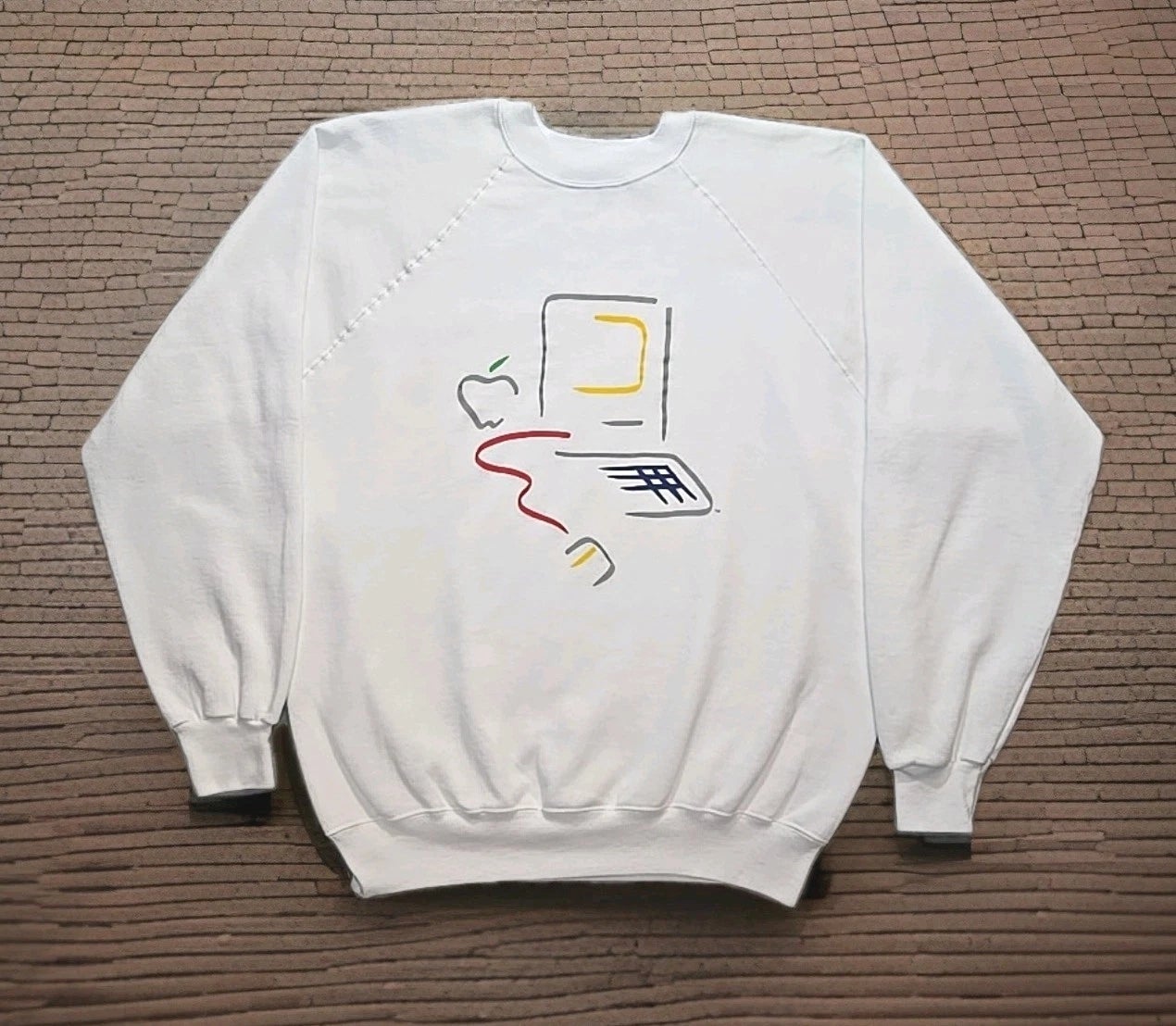 Vintage sweater with abstract machine  and pome  graphics, featuring minimalistic tech design