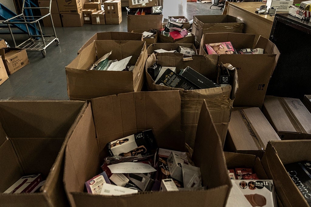 Large cardboard boxes filled with assorted packaging and items successful  a warehouse setting