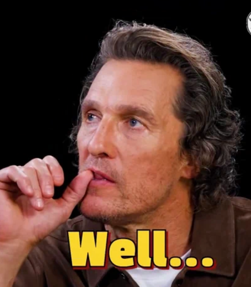 Person thinking, resting chin connected  hand, yellowish  "Well..." substance   below