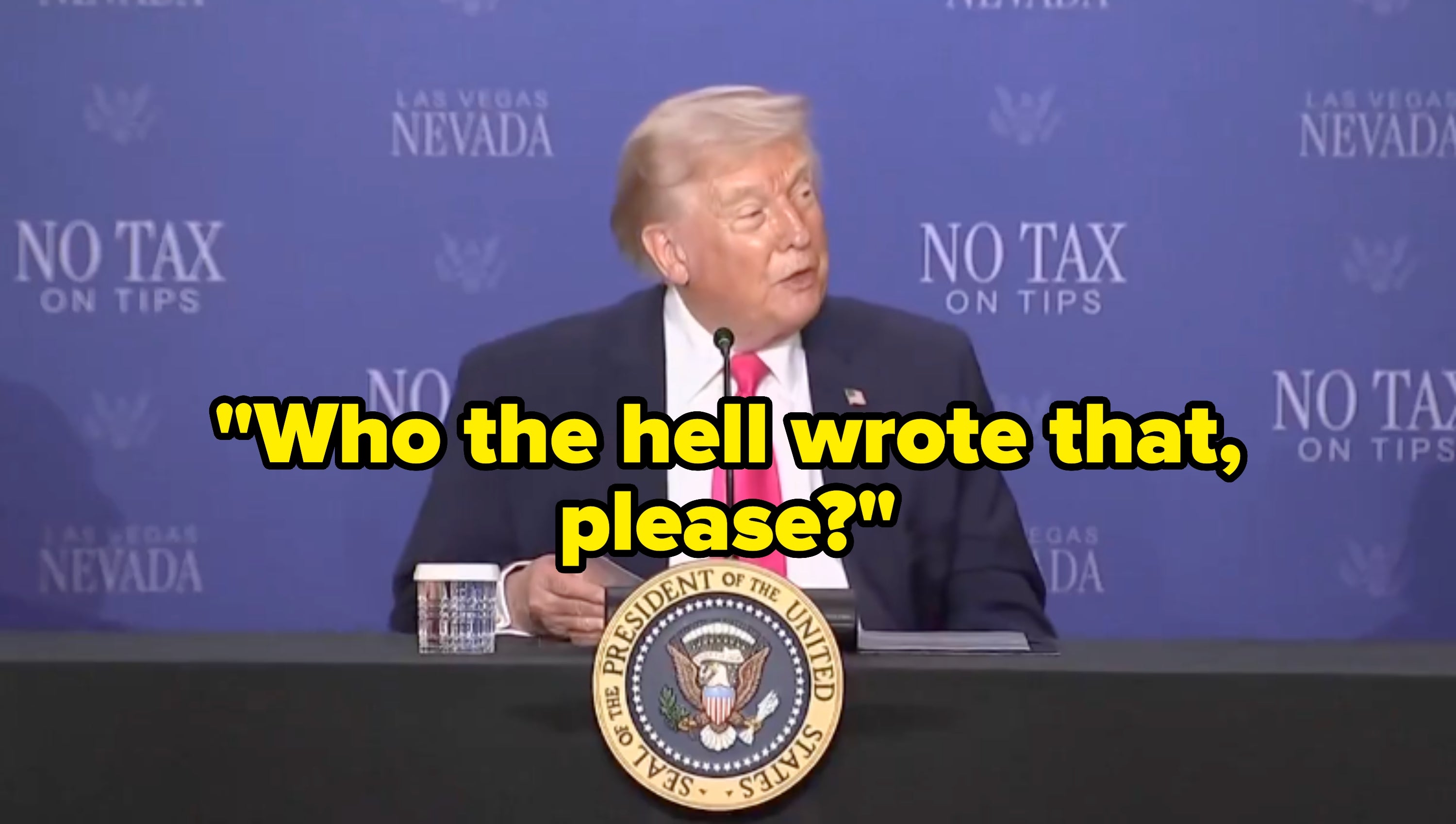 A idiosyncratic   astatine  a podium speaks astatine  a "No Tax connected  Tips" lawsuit   successful  Las Vegas, Nevada, with a motion   down  them