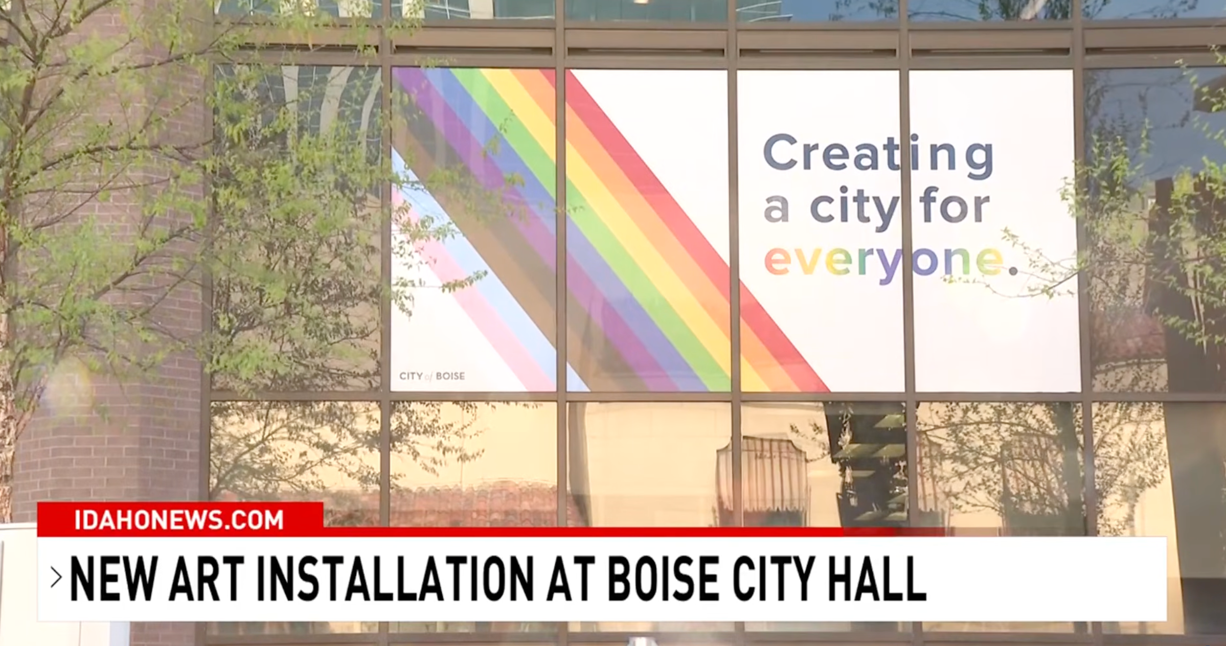 The representation  shows a model   show  astatine  Boise City Hall with a rainbow plan  and the substance   "Creating a metropolis  for everyone."