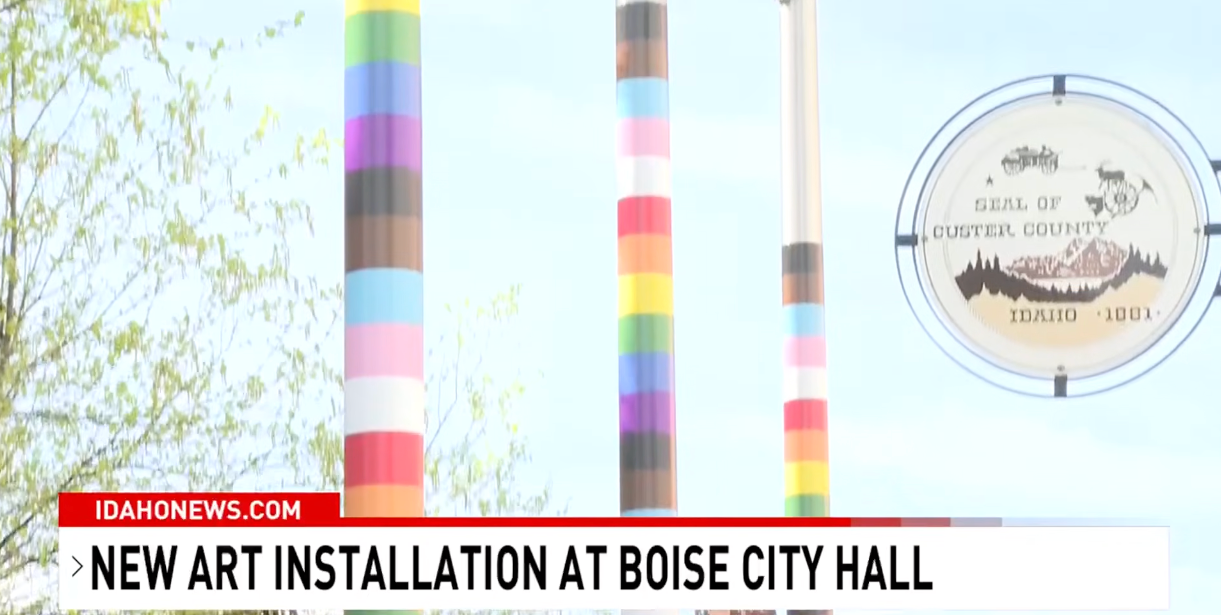 Colorful vertical poles and seal of Boise, announcing a caller   creation  installation astatine  Boise City Hall