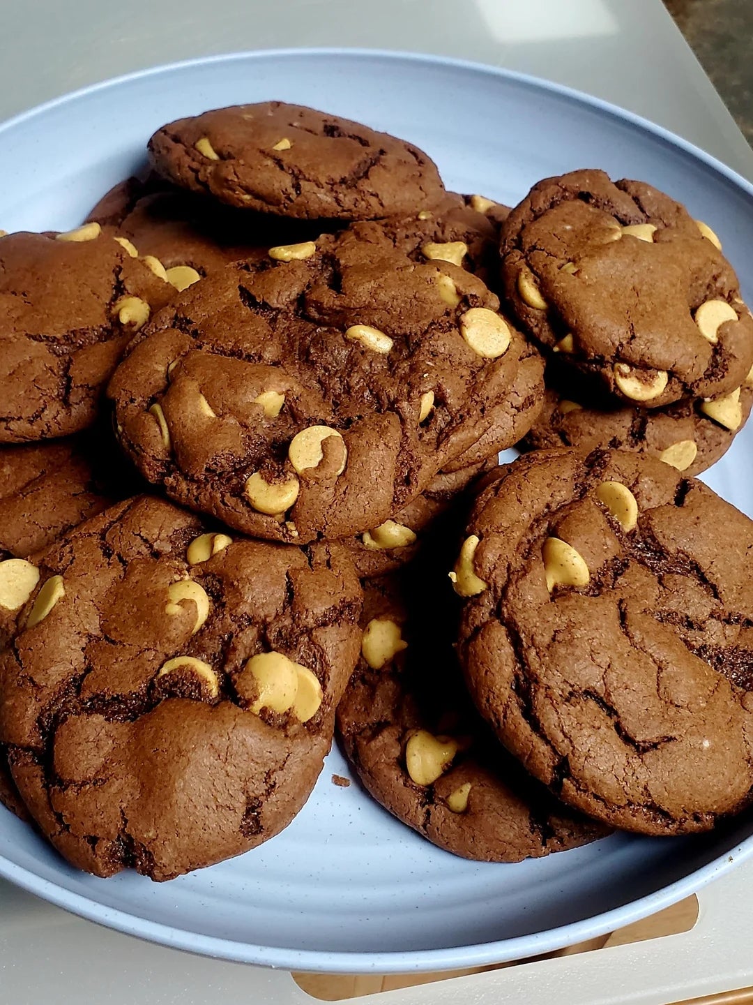 Plate of chocolate cookies with white chocolate chips