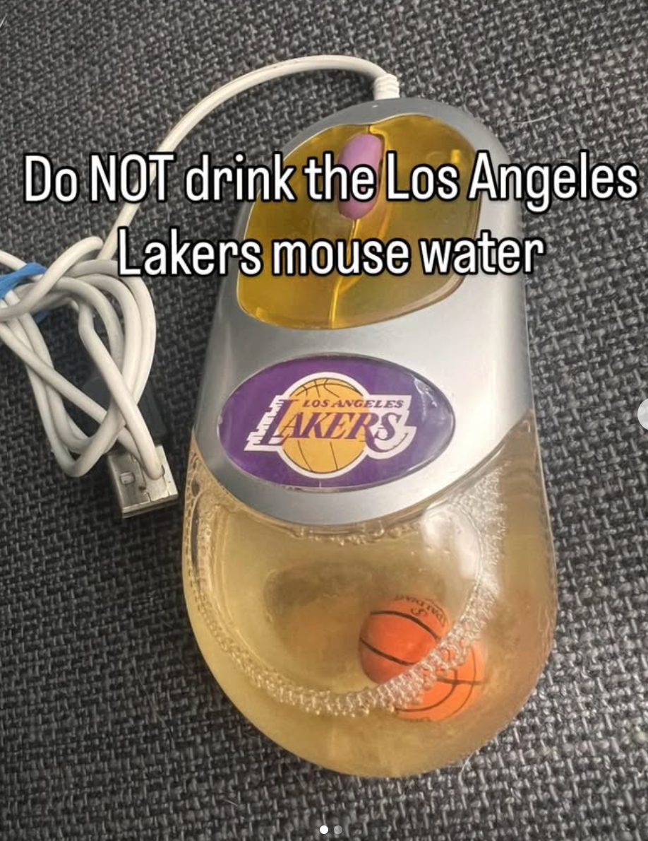Mouse labeled "Los Angeles Lakers" filled with water and a mini basketball. Text warns not to drink the water