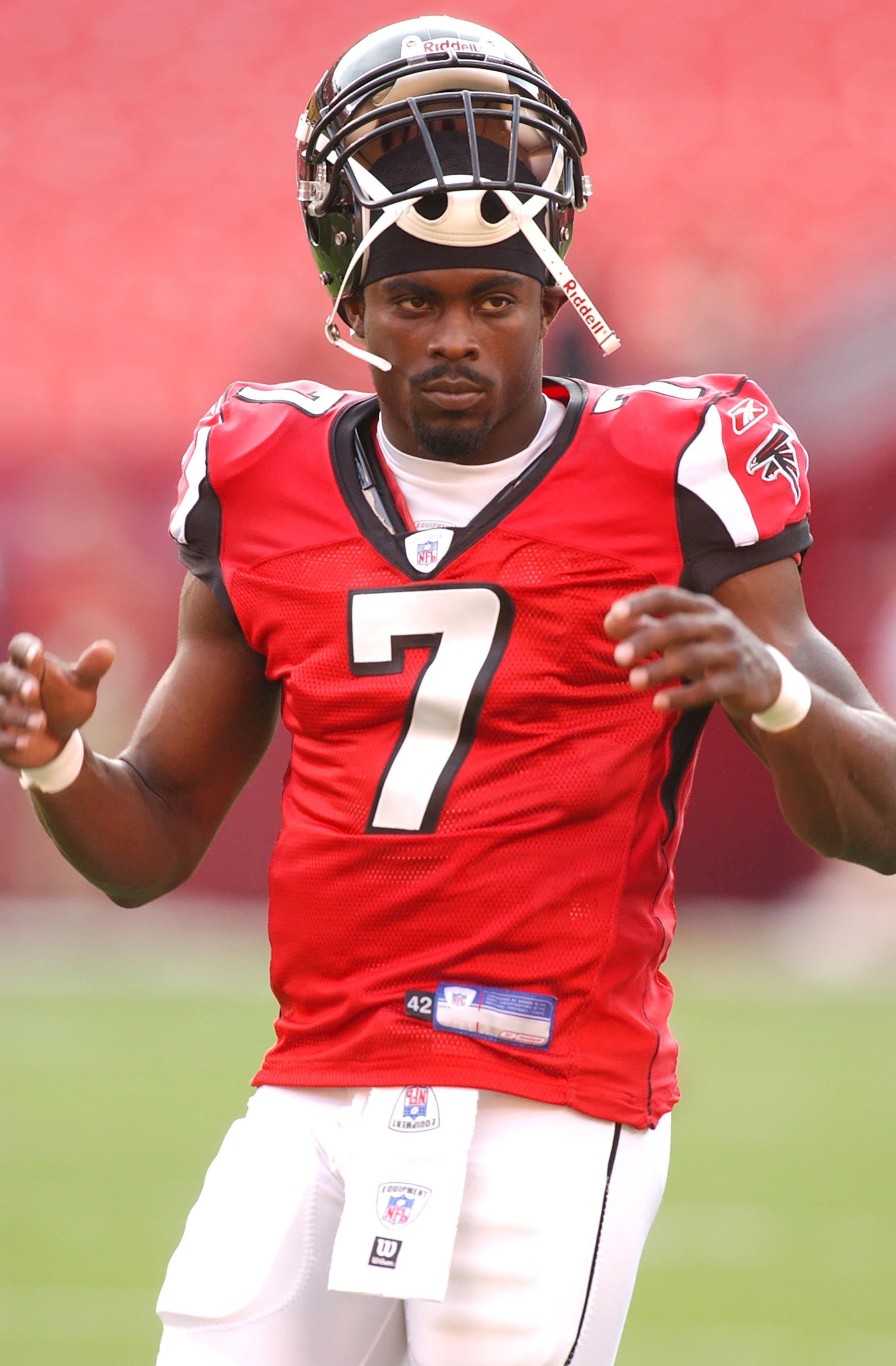 A shot   subordinate    wearing a fig   7 jersey with a helmet connected  apical  of his head, lasting  connected  the tract  earlier  a game