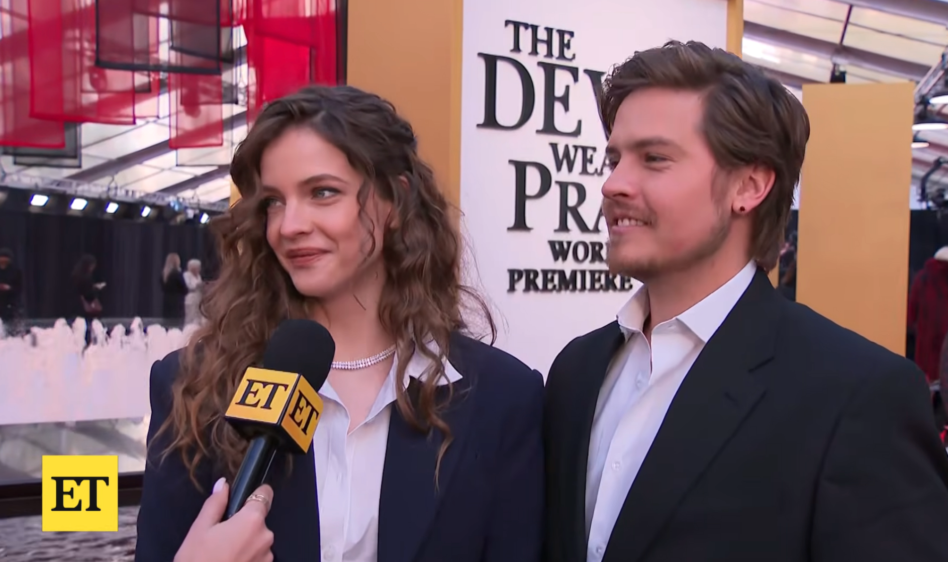 Two radical   successful  ceremonial  attire being interviewed connected  the reddish  carpet astatine  an event