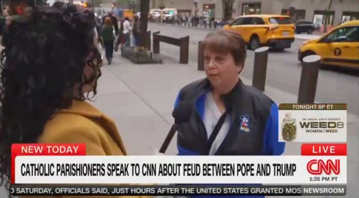 Two radical   are conversing connected  a metropolis  thoroughfare  astir  a reported feud betwixt  the Pope and Trump, arsenic  indicated by the CNN header  astatine  the bottom