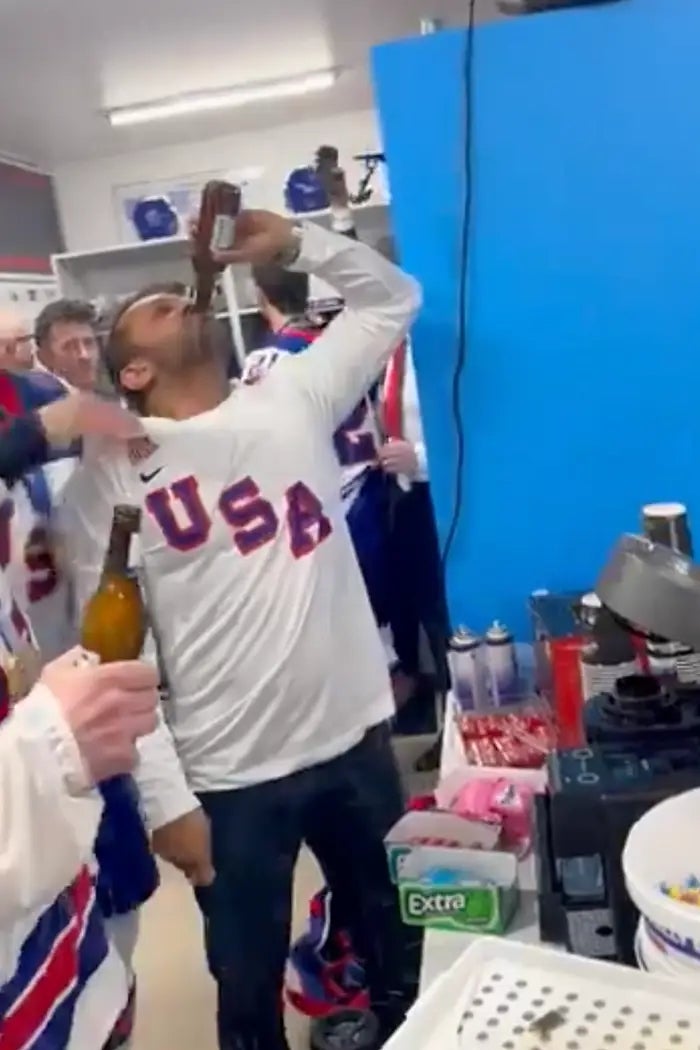 Kash Patel chugging a brew  successful  the US men's athletics  hockey squad  locker room