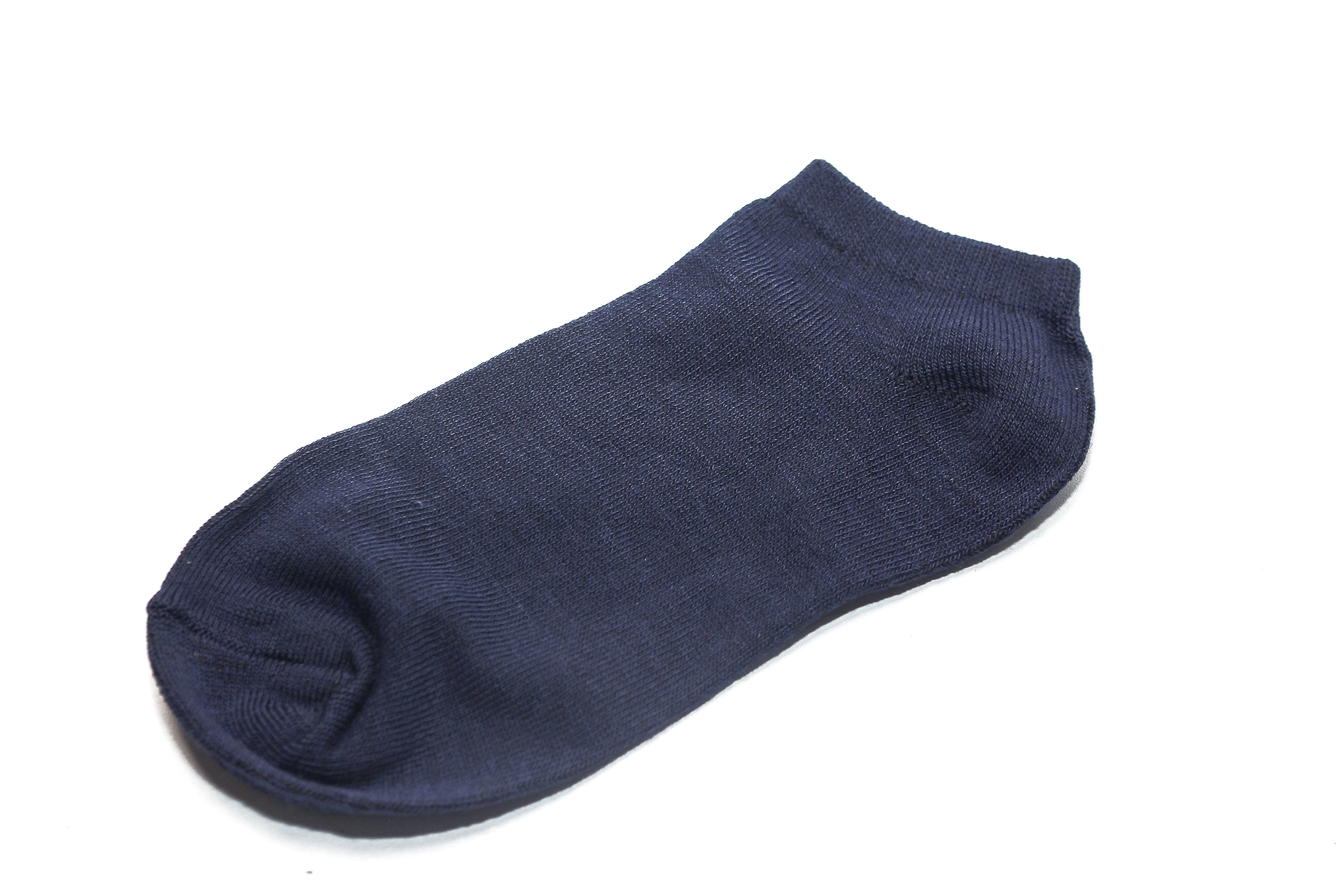 A azygous  ankle sock is shown against a plain background, showcasing its plan  and texture
