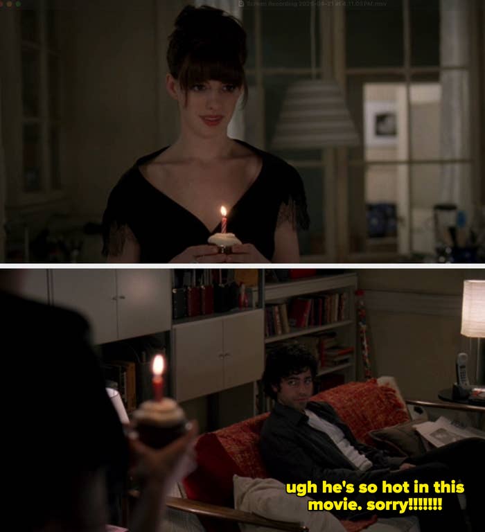 Person holding a lit day   cupcake, wearing a achromatic  formal  with fringe sleeves successful  a softly lit room