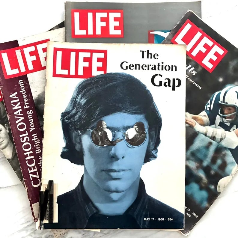 A stack of vintage Life magazines, with 1  featuring a screen  connected  "The Generation Gap" and a idiosyncratic   wearing sunglasses reflecting older adults