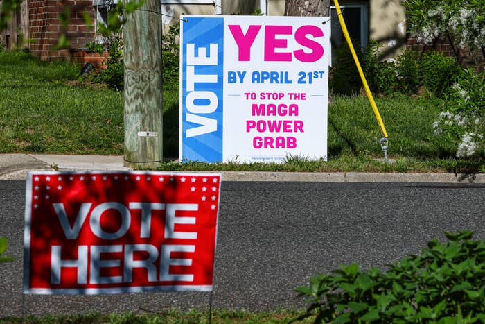  1  says "VOTE YES BY APRIL 21ST TO STOP THE MAGA POWER GRAB," the different   "VOTE HERE."