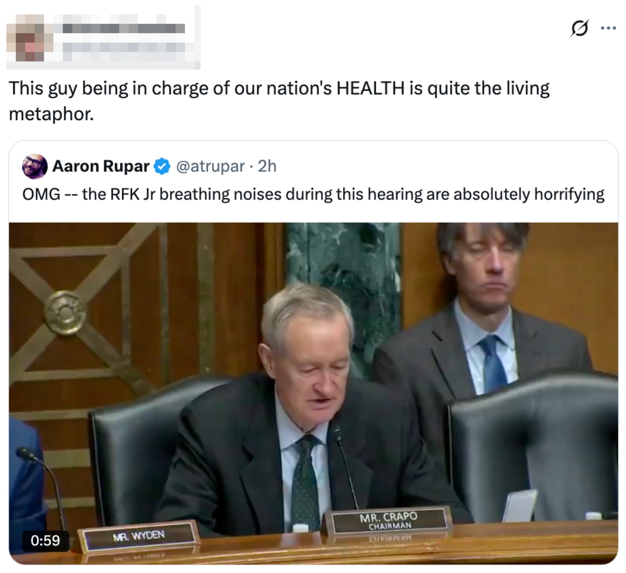 Senator successful  a legislature  hearing, with disposable   nameplates for Mr. Crapo and Mr. Wyden. Adjacent tweet comments connected  RFK Jr.'s breathing noises