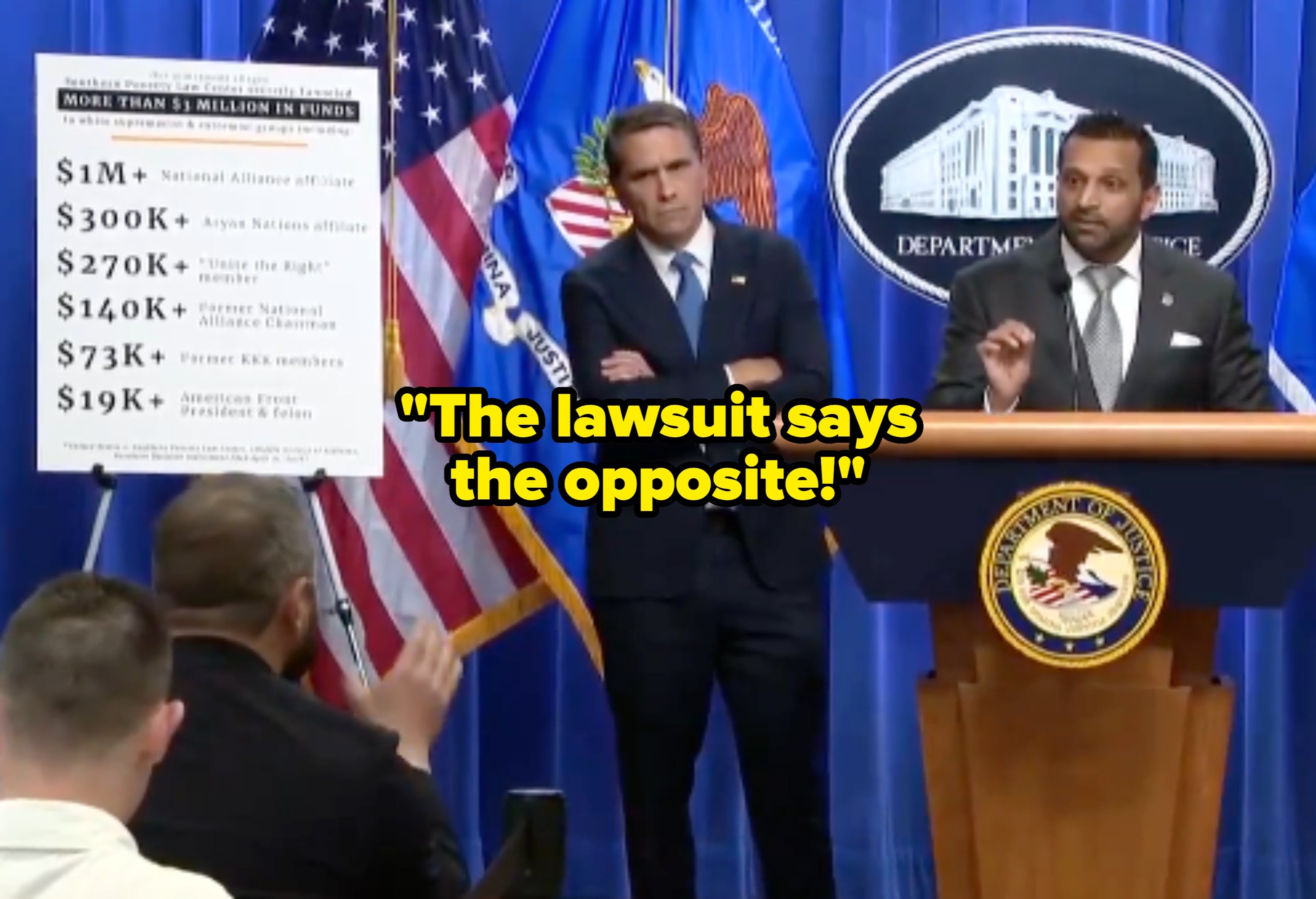 Two officials basal   astatine  a podium successful  a property   conference, discussing funds betterment   arsenic  outlined connected  a adjacent    chart