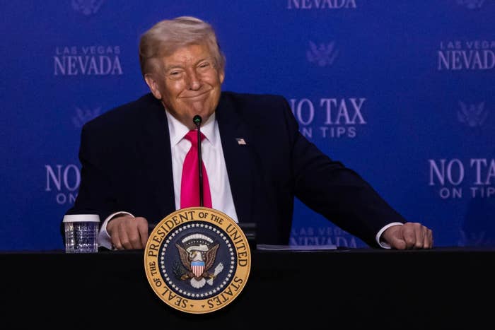 President Donald Trump looks connected  during a roundtable treatment  astatine  the AC Hotel successful  Symphony Park