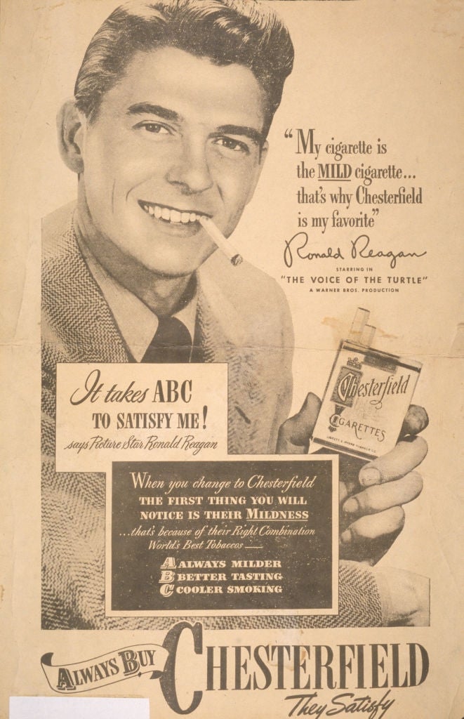 Vintage Chesterfield advertisement  featuring a antheral   with a cigarette, promoting the mildness and sensation  of the brand's cigarettes