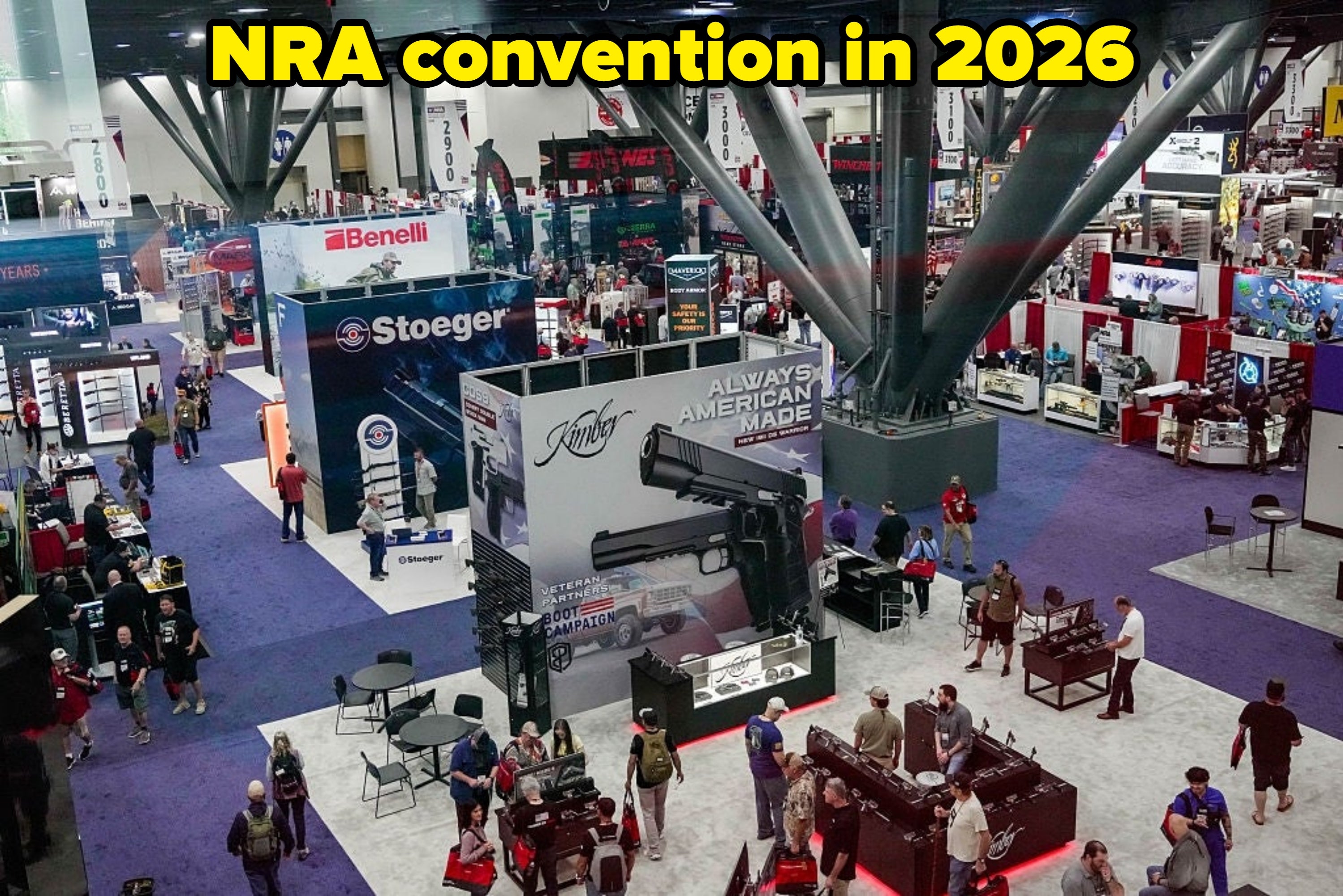 People research  a weapon  accumulation  with ample  displays and vendor booths successful  a normal  center