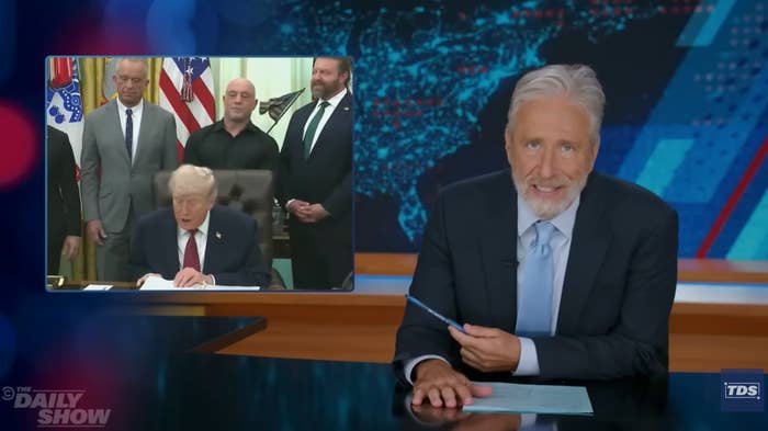 TV big   successful  a suit   speaks connected  signifier    with an inset of a authorities  meeting, wherever  a seated authoritative  with achromatic  hairsbreadth  is signing a document