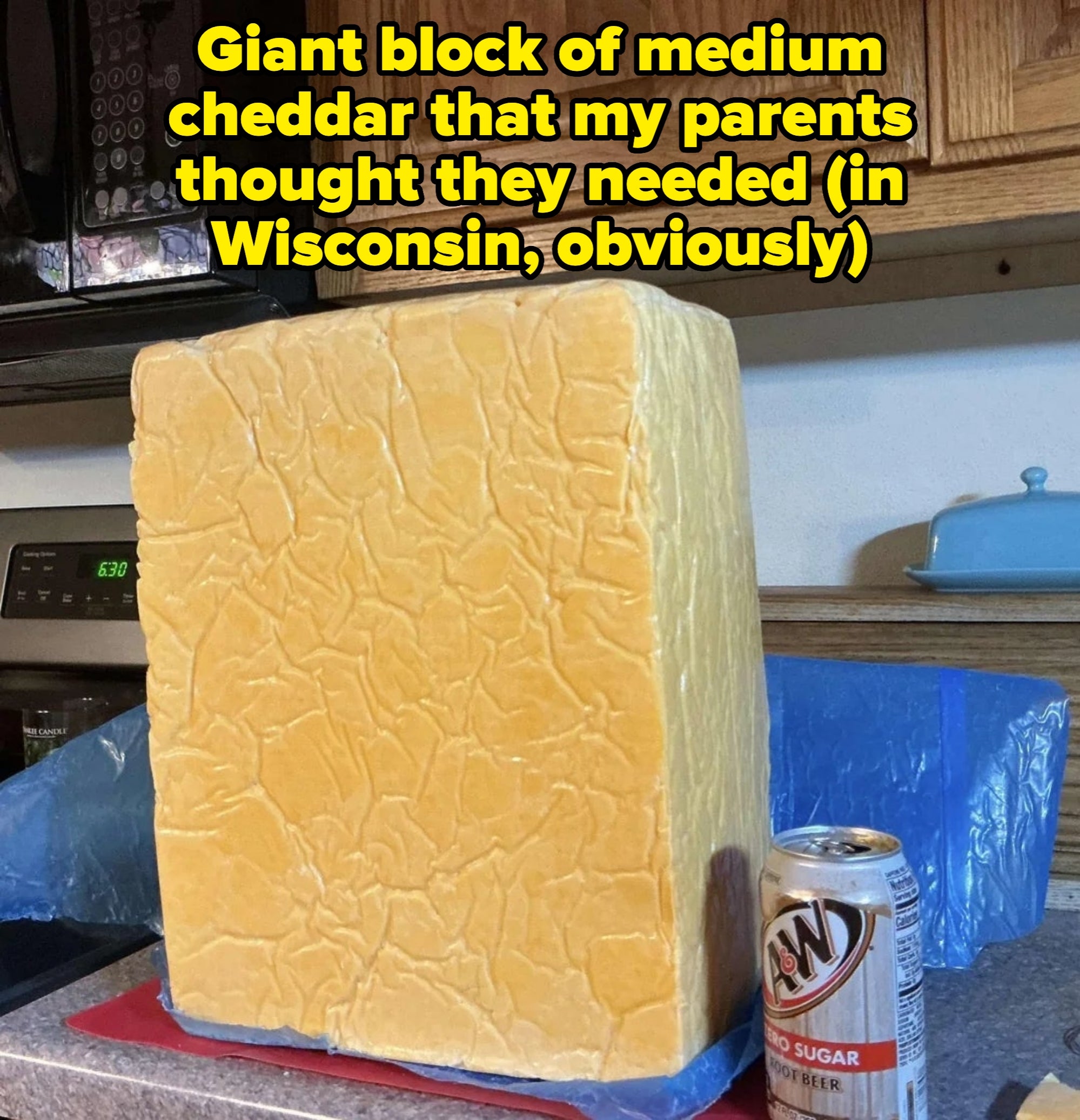 Large artifact  of food  connected  a room  antagonistic  with an A&amp;amp;W soda tin  for scale; woody  cabinets successful  the background