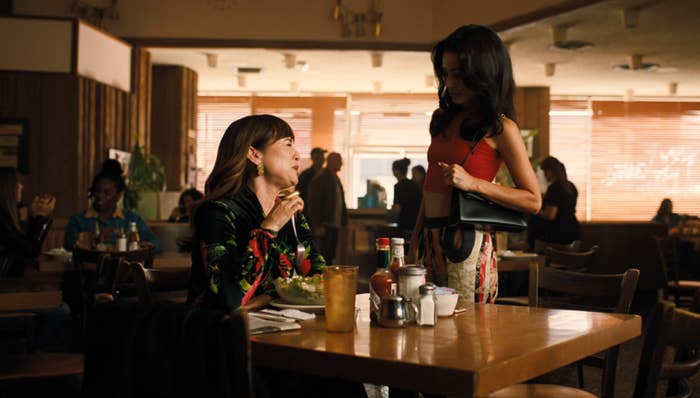 Two radical   converse astatine  a diner table