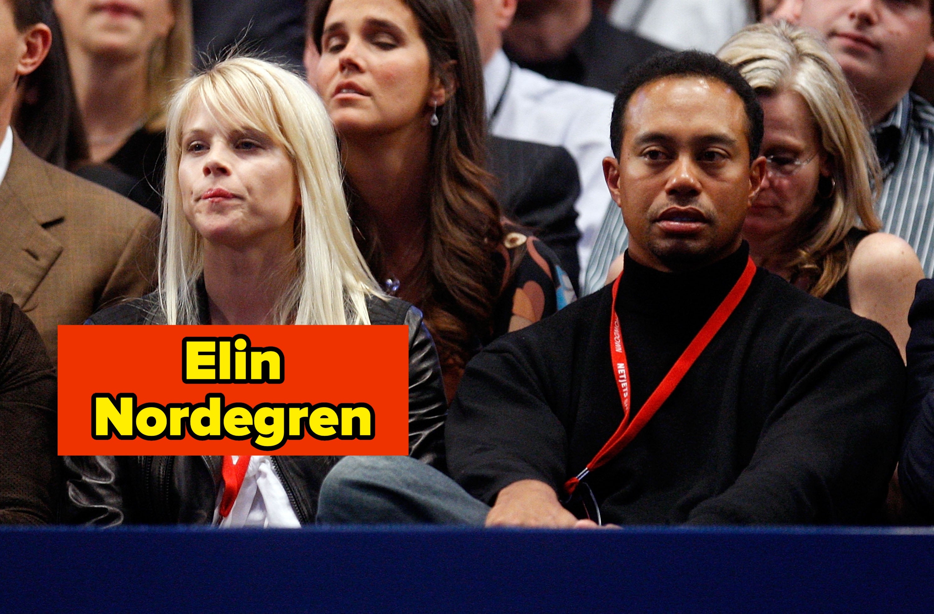 Two radical   beryllium   successful  the assemblage  astatine  a sports event, wearing lanyards. The idiosyncratic   connected  the near  has a leather jacket, and the 1  connected  the close    wears a turtleneck