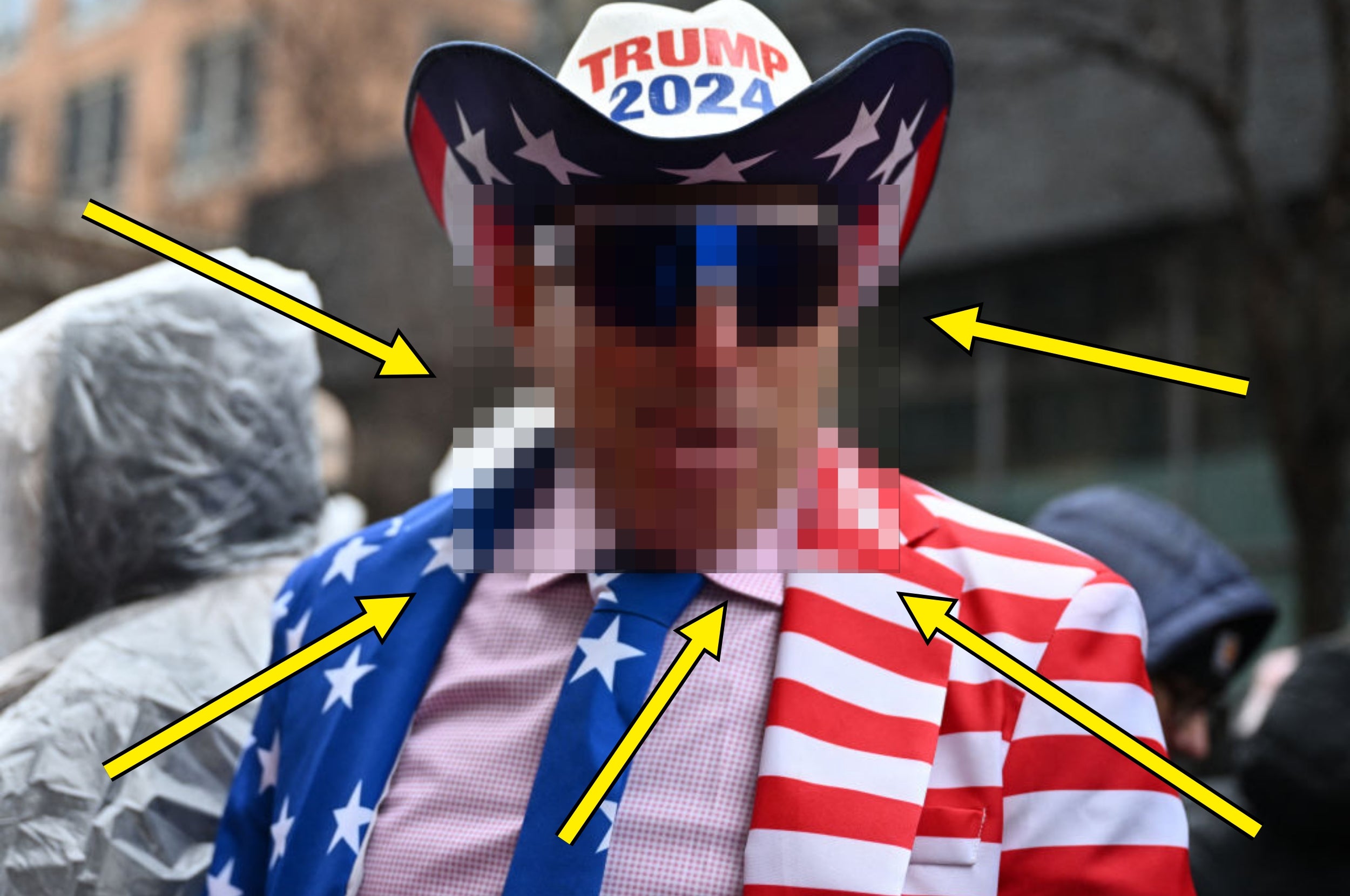Person wearing a hat reading "Trump 2024" and a suit with a star-spangled pattern in a public setting