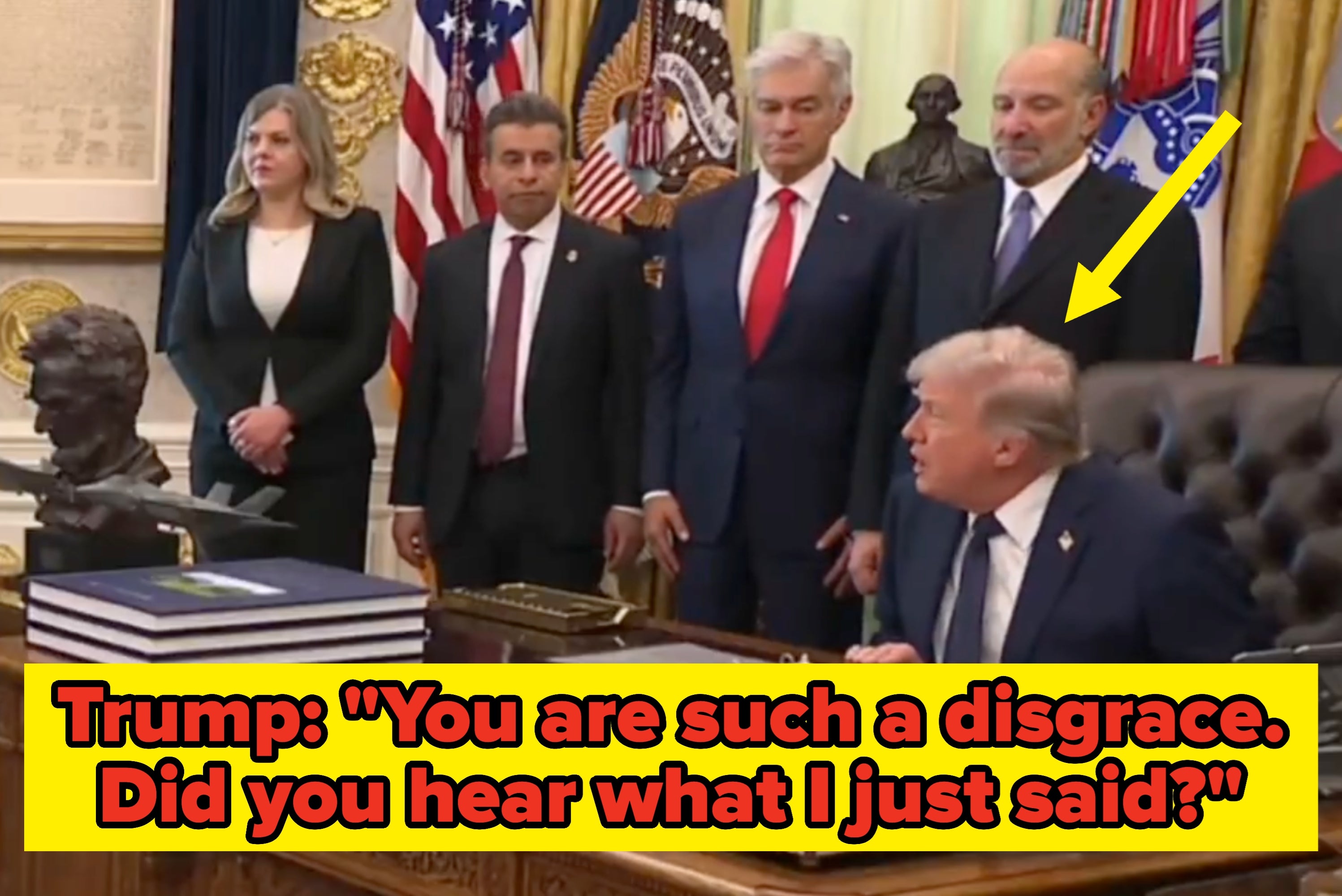 A radical  of individuals basal   down  a table  successful  an authoritative  setting. One idiosyncratic   sits, appearing to speak