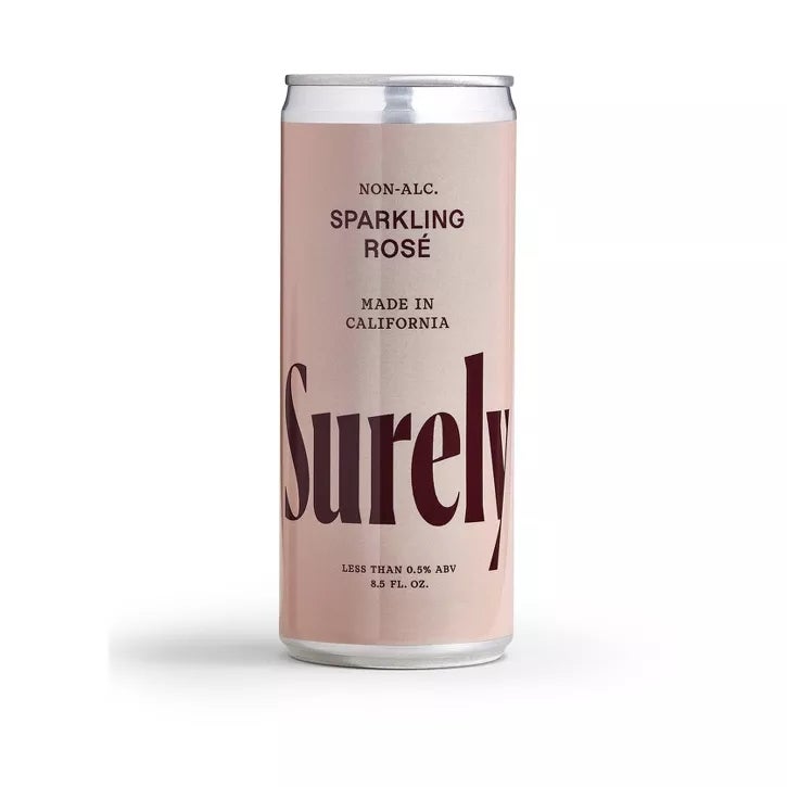 Can of Surely non-alcoholic sparkling rosé from California, labeled with less than 0.5% ABV and 8.5 fl. oz. capacity