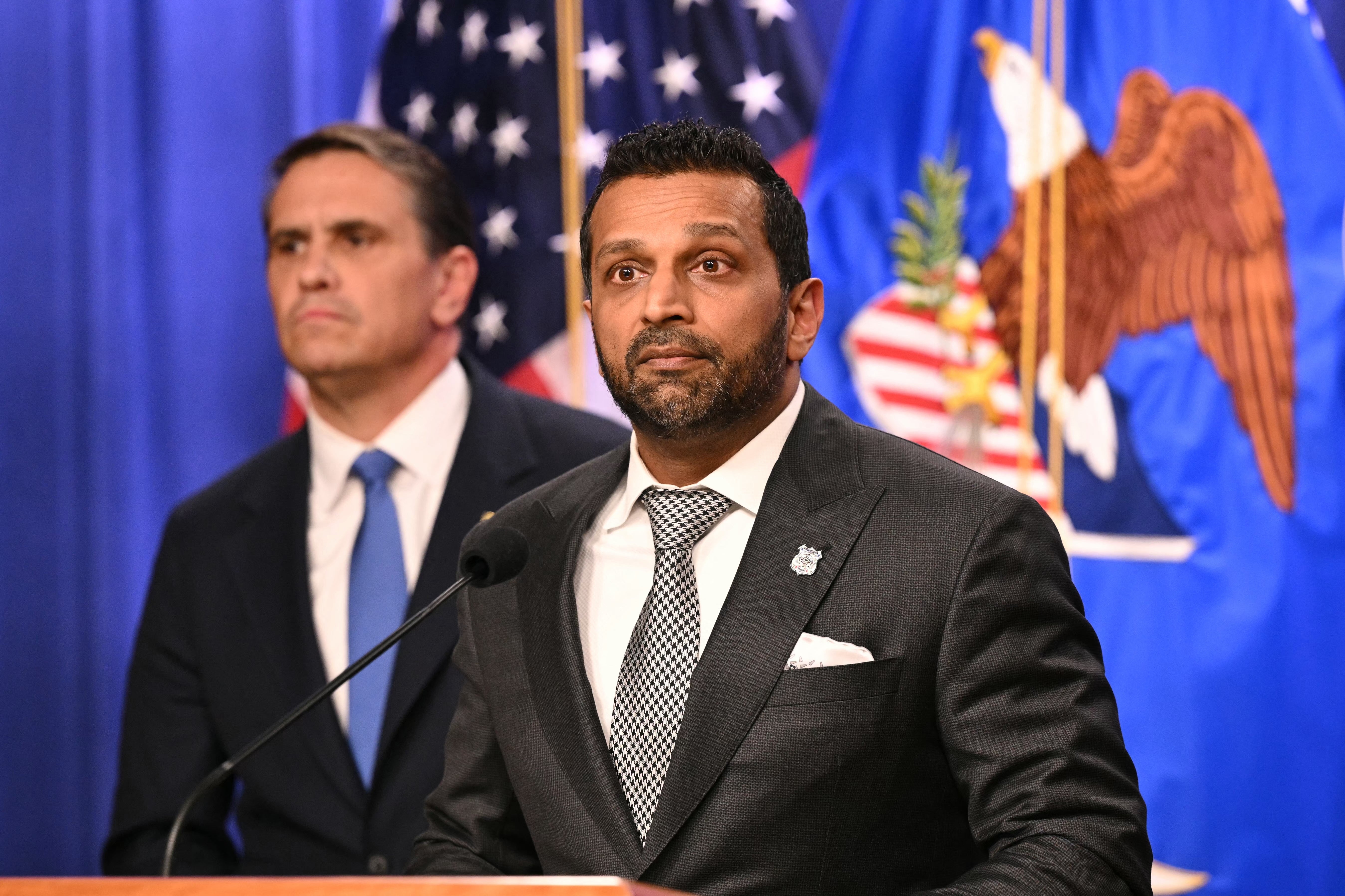 FBI Director Kash Patel speaks with US Acting Attorney General Todd Blanche adjacent  to him during a property   league  astatine  the Department of Justice successful  Washington, DC