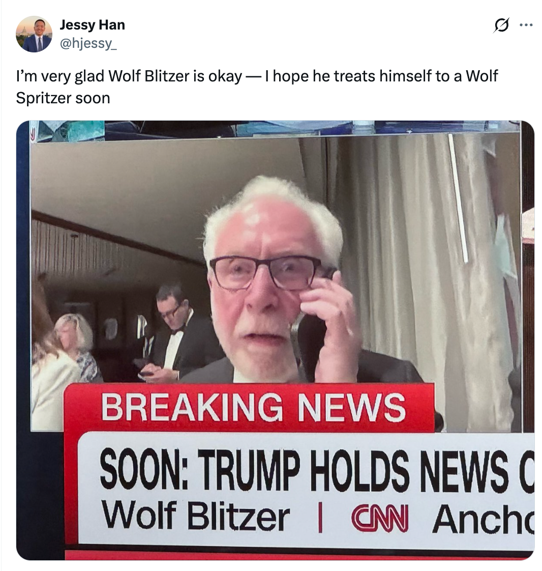 Wolf Blitzer appears on a CNN broadcast, phone to ear with a concerned expression. Text reads: “SOON: TRUMP HOLDS NEWS CON.”