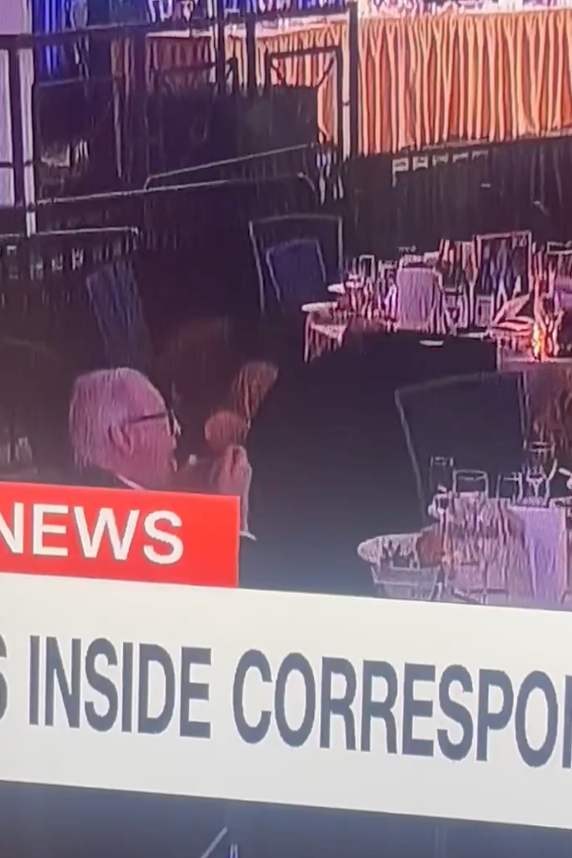 News event scene showing attendees at a formal dinner, with a visible banner headline partially reading "INSIDE CORRESPON"