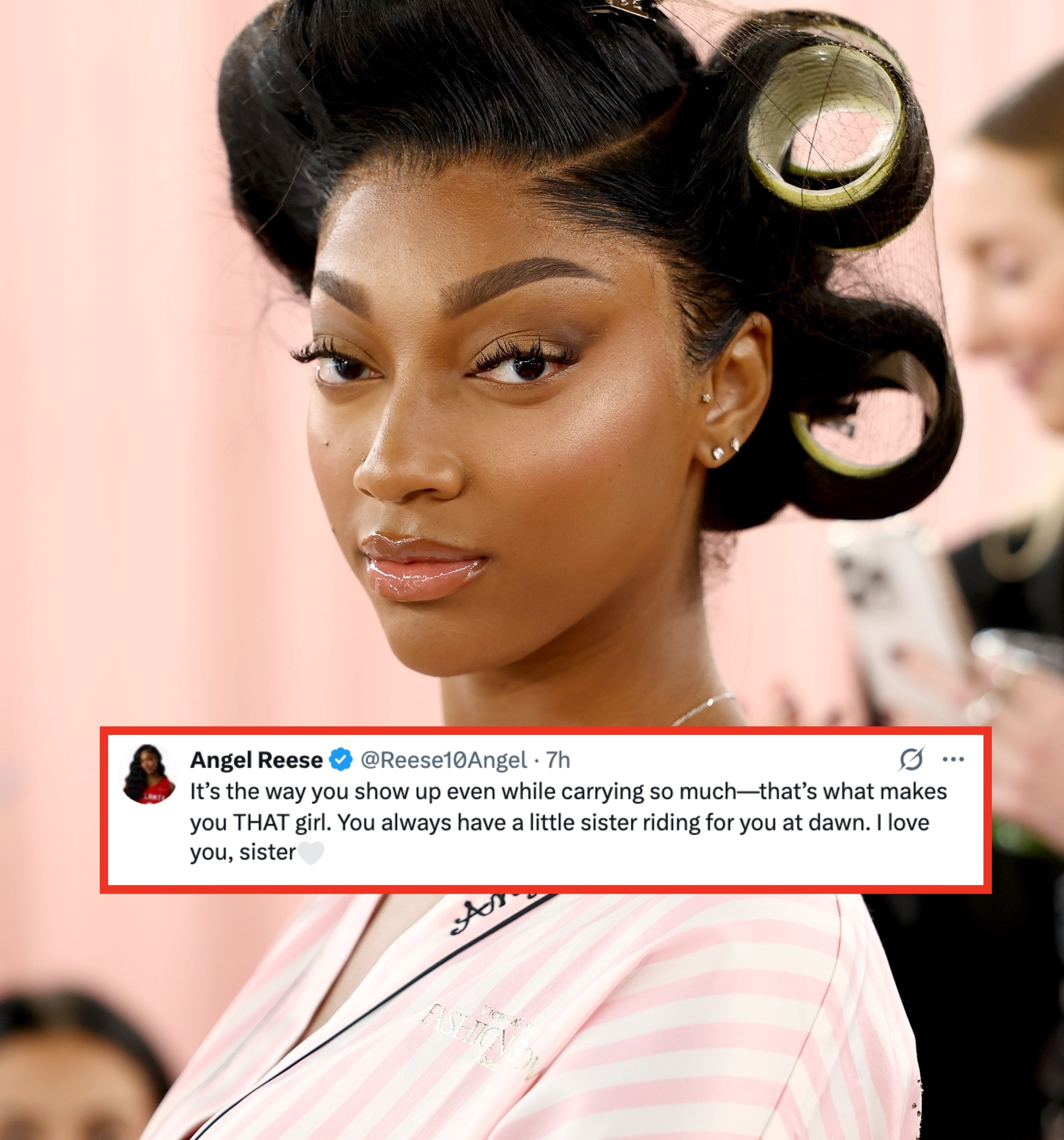 Angel Reese with styled hairsbreadth  successful  ample  rollers, wearing a striped robe, poses confidently successful  a casual indoor setting