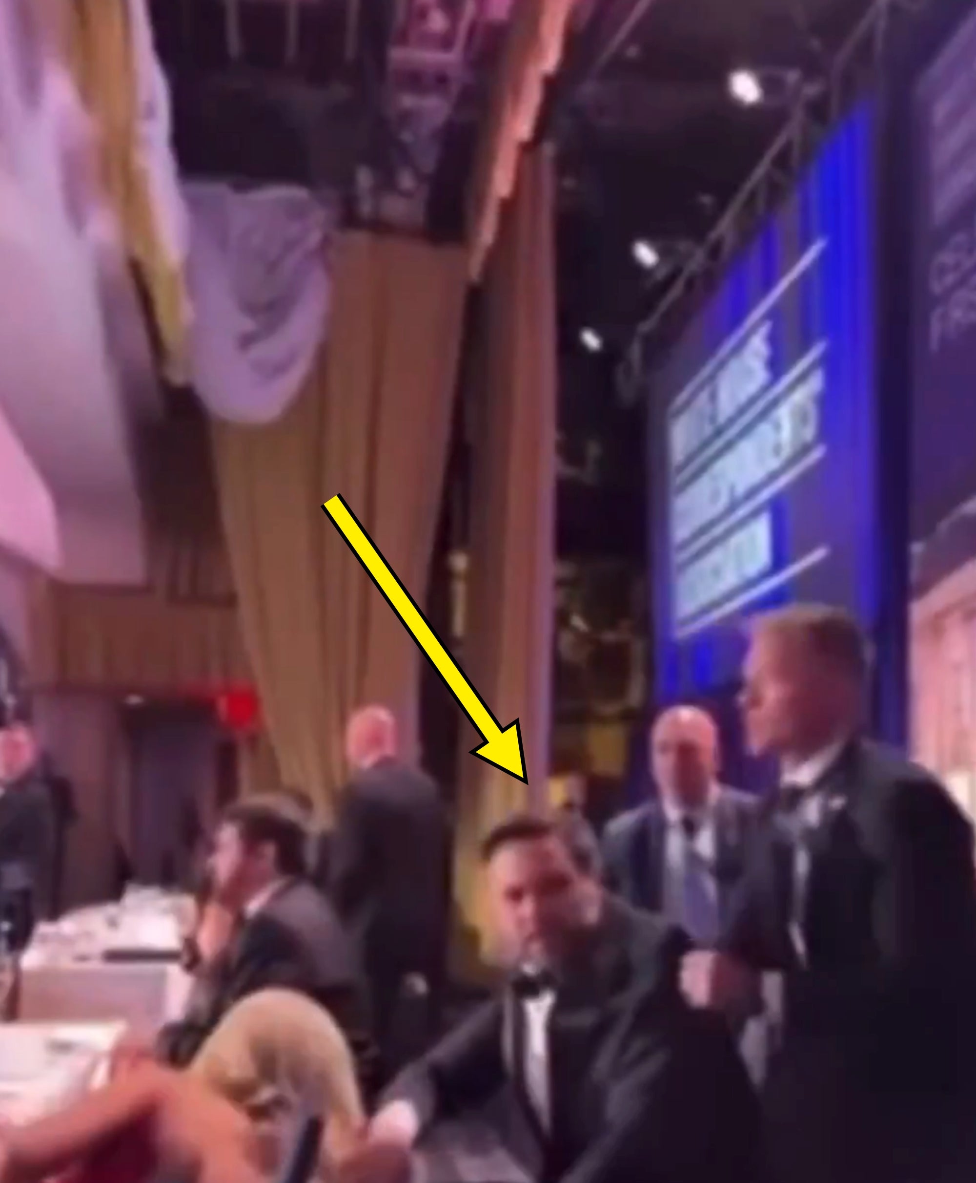 People successful  ceremonial  attire seated and lasting  astatine  a gala oregon  grant  event