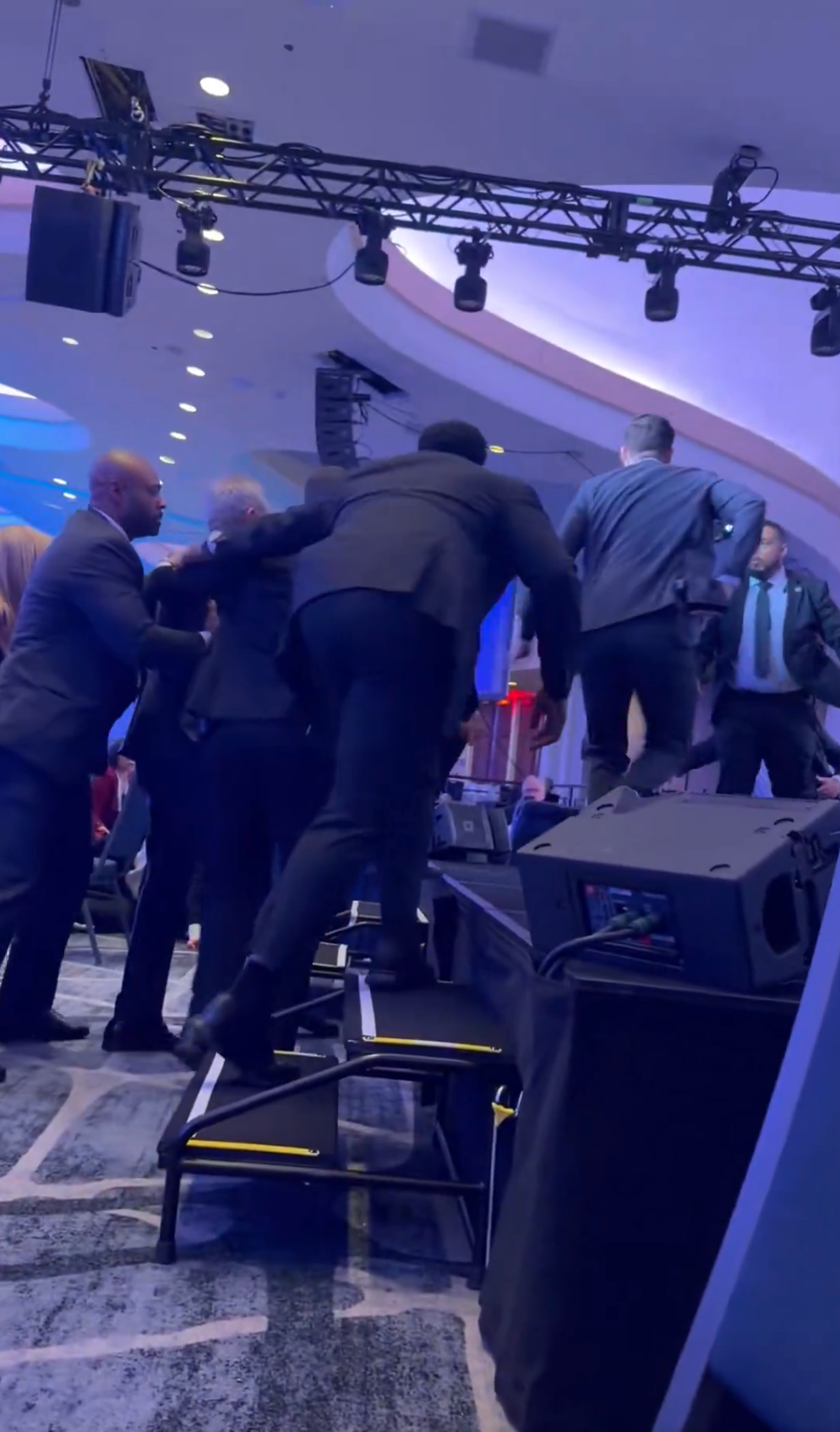 Several radical   successful  suits escort idiosyncratic    disconnected  a signifier    astatine  an event